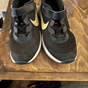 Nike Kids Black and Gold Sneakers